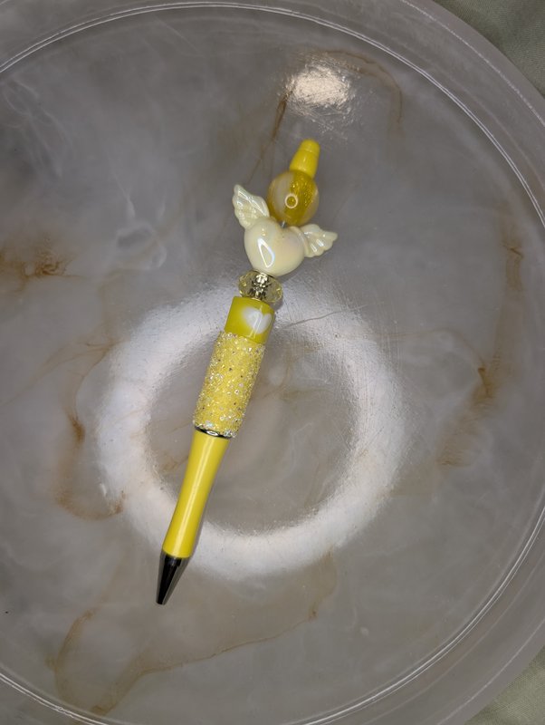 Yellow beaded pen